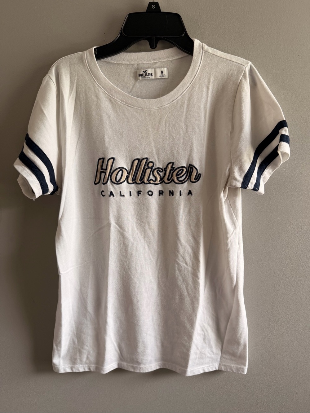 Hollister White Tee with Navy Script & Sleeve Stripes
